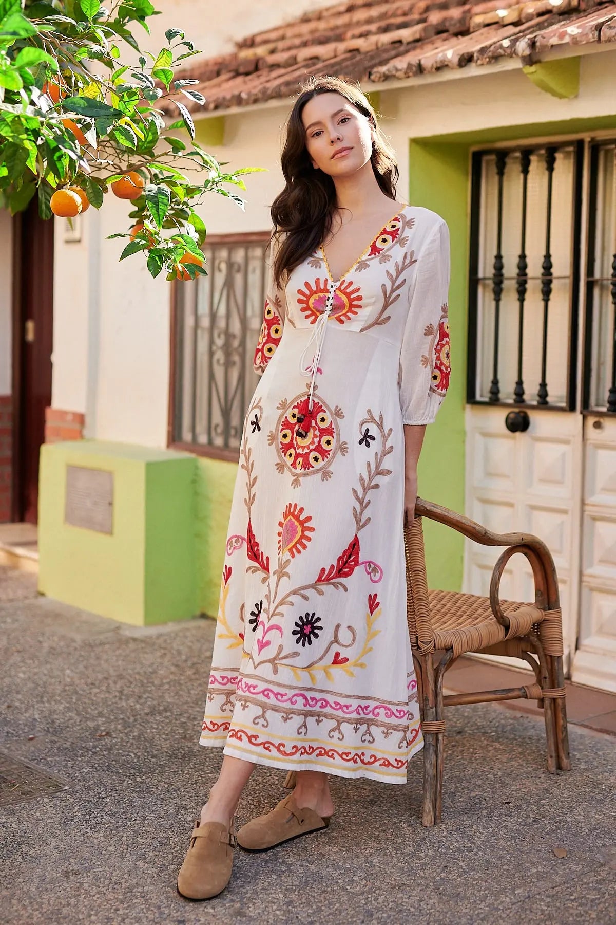 Long plain dress with colorful embroidery SARBACANE